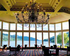 Elegant foyer of the Ardgartan Hotel featuring a large bay window with stunning views across the loch.