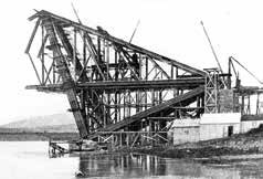 Old photograph of the unfinished section of Loch Creran Bridge at Ballachulish, set against a backdrop of natural scenery.