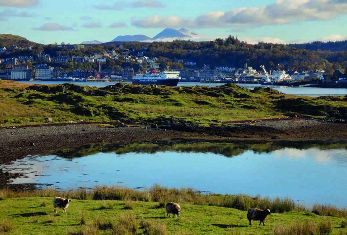 Long distance view of Oban harbour in spring