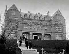 Vintage photograph of the Highland Hotel, showcasing its historic architecture and picturesque surroundings.