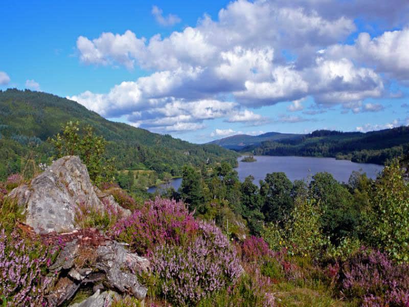 The serene location of Loch Achray Hotel offers a varied selection of walks, view from one of the smaller peaks.